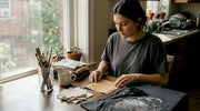 Person preparing to customise vintage metal tee