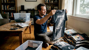 Collector examines vintage 90s metal band shirts