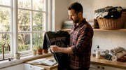 Collector inspects vintage heavy metal t shirt