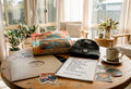 Tour exclusive band merchandise on wooden table