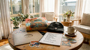 Tour exclusive band merchandise on wooden table