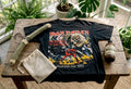Vintage band shirt with preservation tools on table