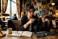 Collector examining vintage band shirt details