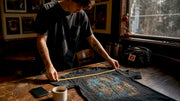 Person measuring chest of band shirt