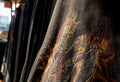 Close-up vintage heavy metal band shirt print detail