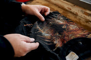 Close-up of vintage metal shirt fabric and stitching